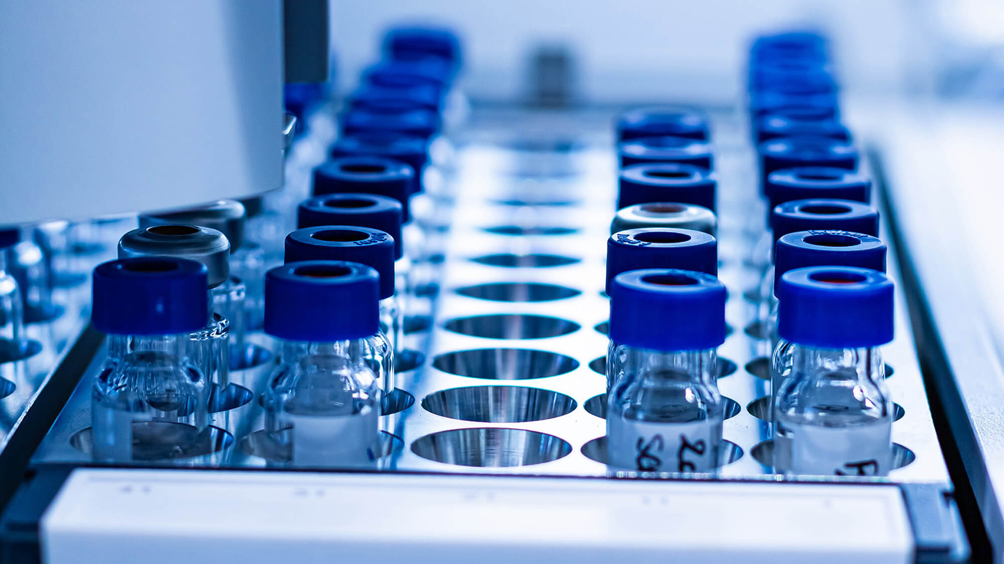 HPLC glass vials in the rack at analytical pharma laboratory